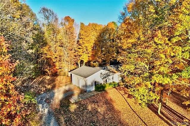 10.2 Acres of Land with Home for Sale in Otisville, Michigan