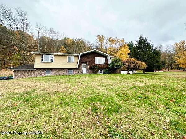 11.2 Acres of Land with Home for Sale in Drums, Pennsylvania
