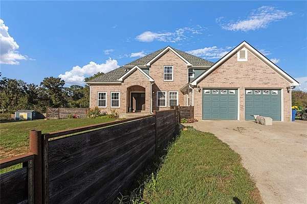 10 Acres of Land with Home for Sale in Odessa, Missouri