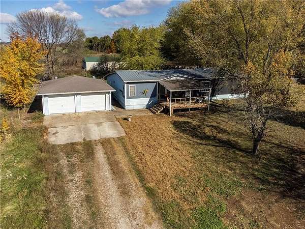 10 Acres of Residential Land with Home for Sale in Harrisonville, Missouri