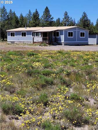 5.88 Acres of Land with Home for Sale in Chemult, Oregon
