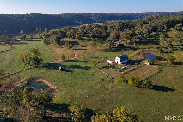 411 Acres of Land with Home for Sale in Alton, Missouri