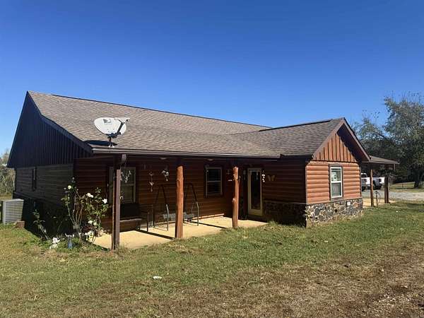4.62 Acres of Land with Home for Sale in Cove, Arkansas