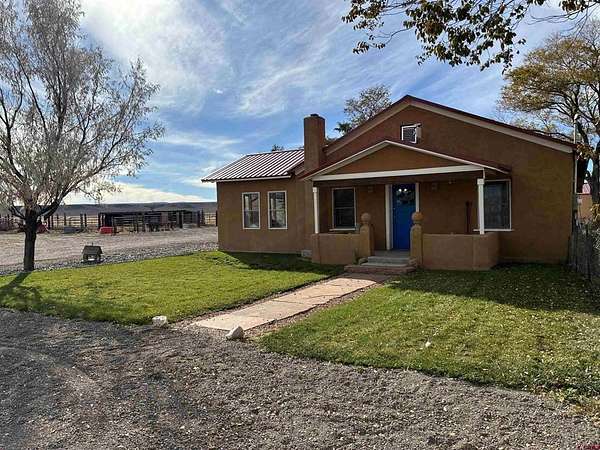 5 Acres of Land with Home for Sale in Antonito, Colorado