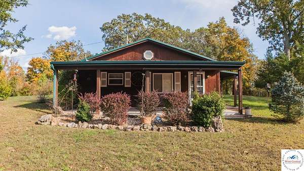 5.3 Acres of Residential Land with Home for Sale in Warsaw, Missouri