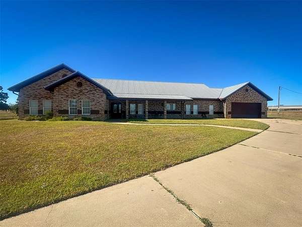 16.5 Acres of Land with Home for Sale in Cameron, Texas