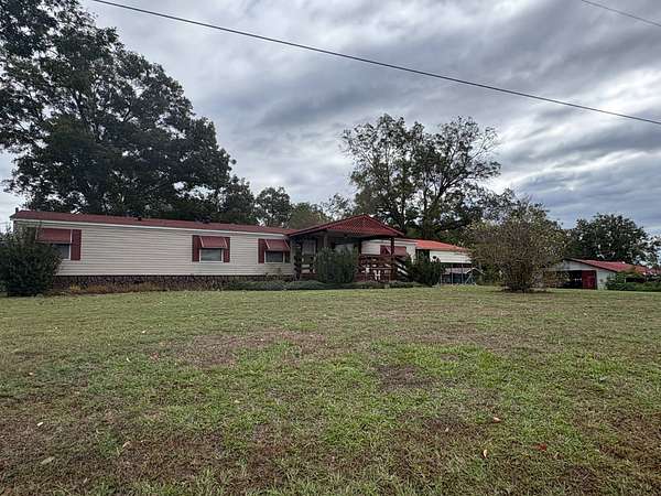 6 Acres of Land with Home for Sale in Magnolia, Arkansas