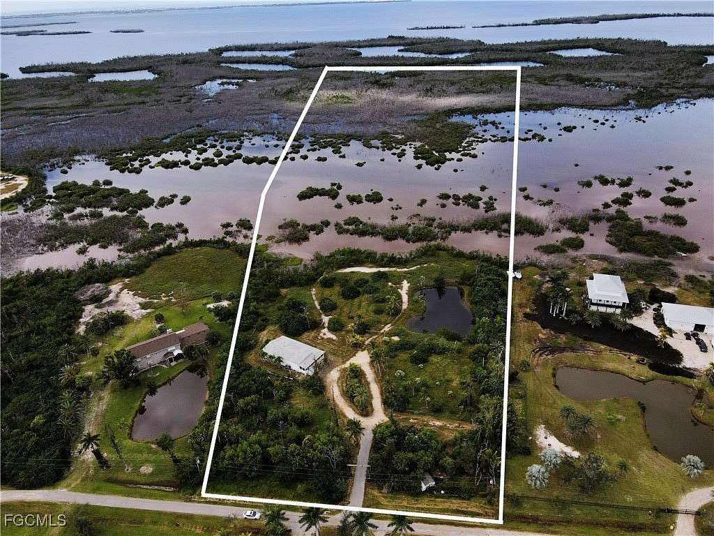 13.8 Acres of Land with Home for Sale in St. James City, Florida