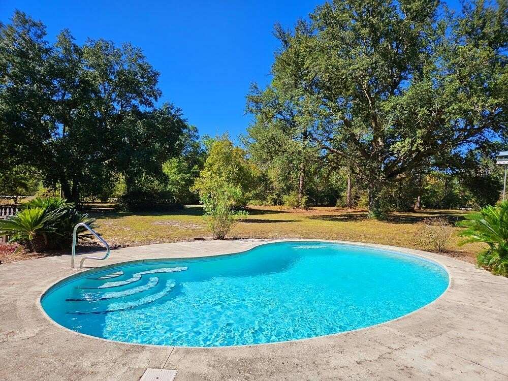 5.7 Acres of Land with Home for Sale in Crestview, Florida