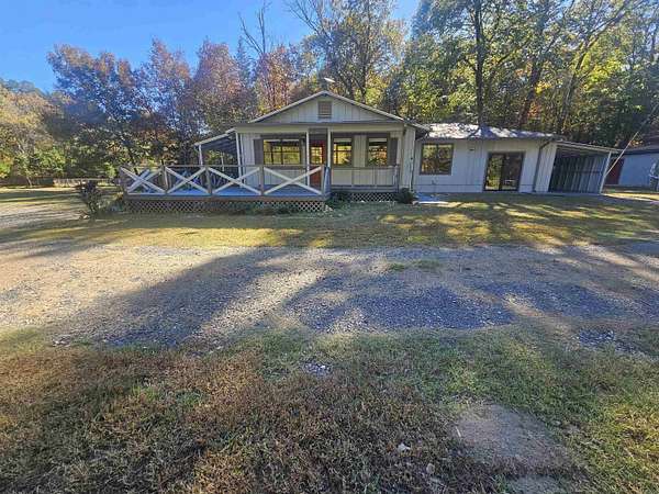 14 Acres of Land with Home for Sale in Mena, Arkansas