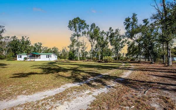 5 Acres of Residential Land with Home for Sale in Lee, Florida