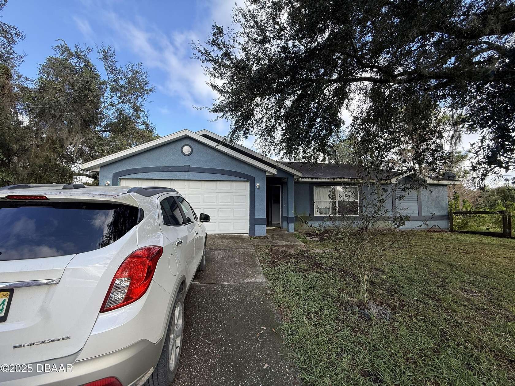 3.34 Acres of Residential Land with Home for Sale in De Leon Springs, Florida