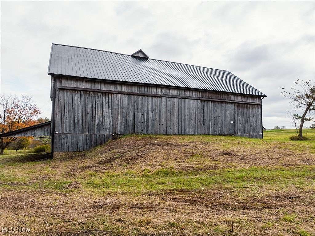 5.64 Acres of Residential Land with Home for Auction in Millersburg, Ohio