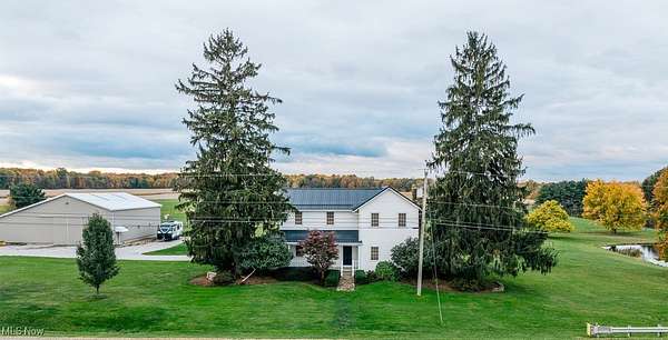 65.8 Acres of Land with Home for Auction in Cortland, Ohio