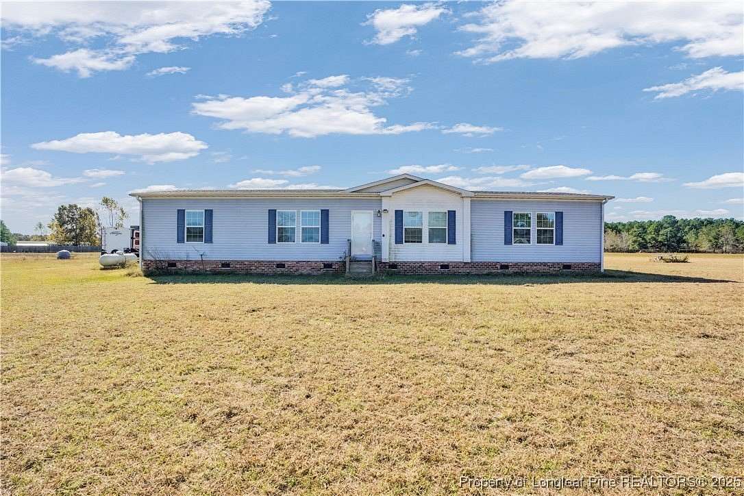 3.5 Acres of Residential Land with Home for Sale in Raeford, North Carolina