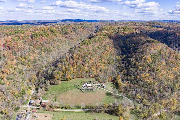 119 Acres of Land with Home for Sale in Hilham, Tennessee
