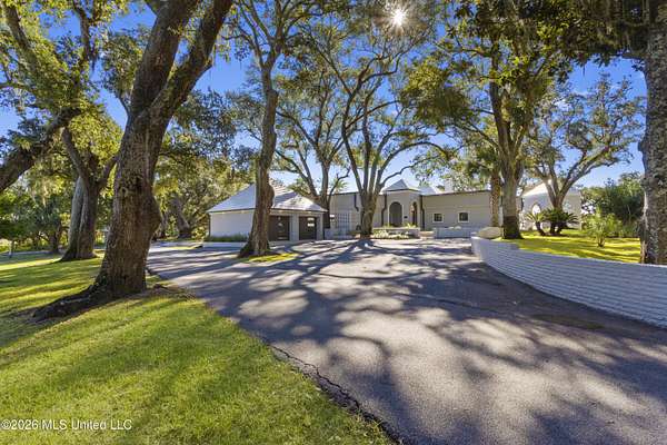 2.5 Acres of Land with Home for Sale in Gautier, Mississippi