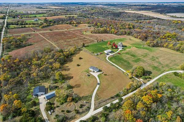 5 Acres of Residential Land with Home for Sale in Winterset, Iowa