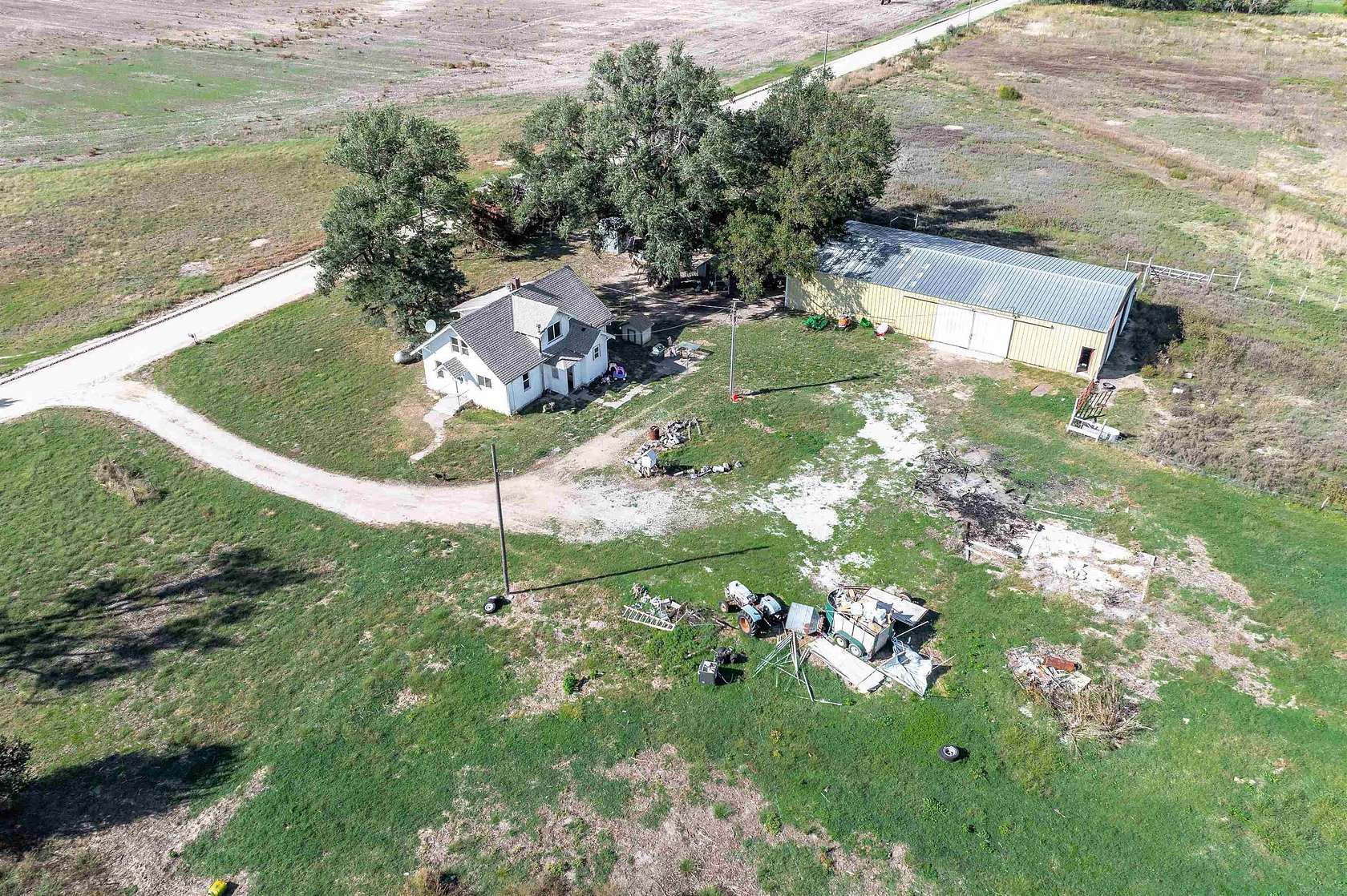 77 Acres of Agricultural Land with Home for Sale in Burrton, Kansas