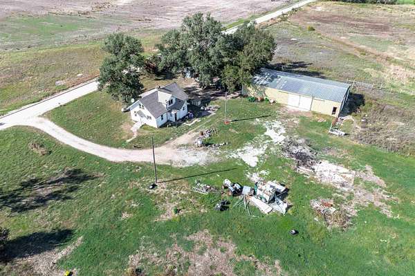 77 Acres of Agricultural Land with Home for Sale in Burrton, Kansas