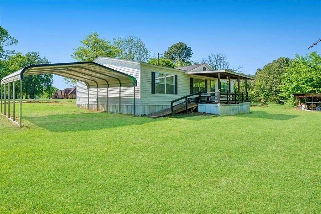 2 Acres of Residential Land with Home for Sale in Bogata, Texas