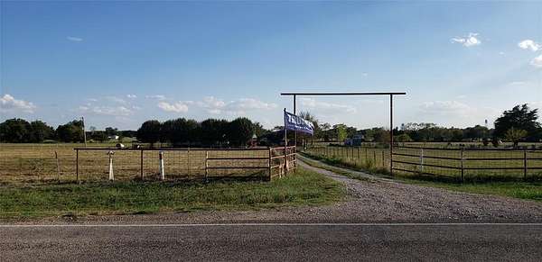 10.3 Acres of Land with Home for Sale in Savoy, Texas