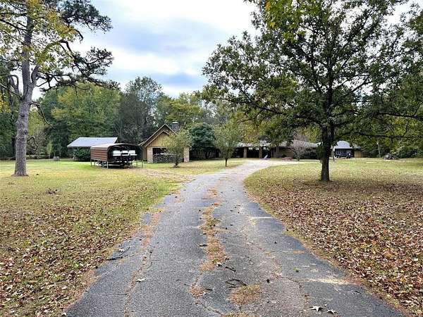3.24 Acres of Residential Land with Home for Sale in Mount Pleasant, Texas