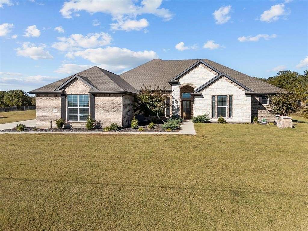 2 Acres of Residential Land with Home for Sale in Poolville, Texas