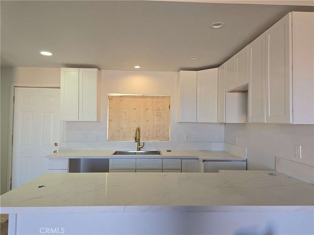 5 Acres of Residential Land with Home for Sale in Landers, California