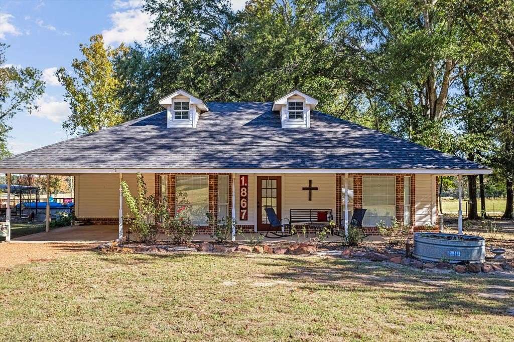 2.82 Acres of Residential Land with Home for Sale in Grapeland, Texas