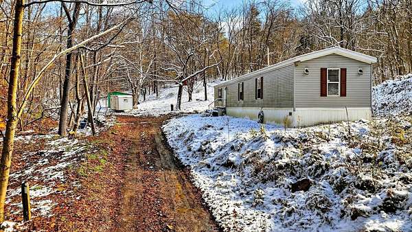 8.4 Acres of Residential Land with Home for Sale in Jackson, Ohio