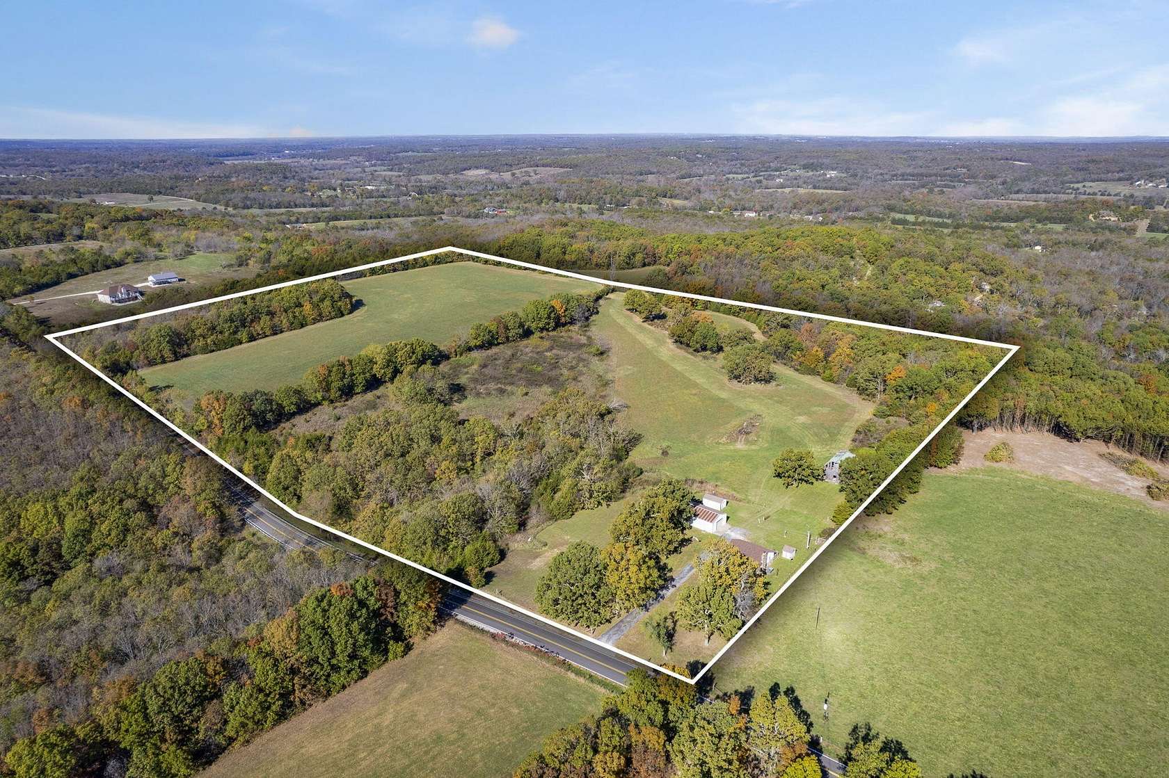 40 Acres of Recreational Land with Home for Sale in Pleasant Hope, Missouri