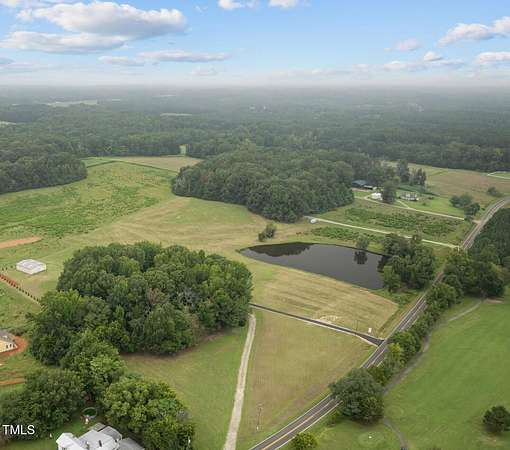 5.57 Acres of Residential Land with Home for Sale in Mebane, North Carolina