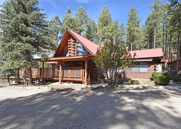 3.1 Acres of Residential Land with Home for Sale in Jemez Springs, New Mexico