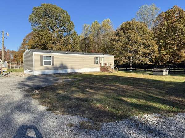 1.84 Acres of Residential Land with Home for Sale in Russell Springs, Kentucky