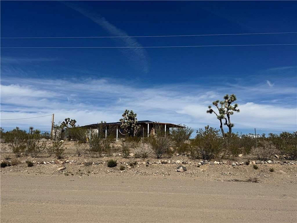 1.67 Acres of Residential Land with Home for Sale in Dolan Springs, Arizona