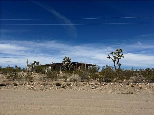 1.67 Acres of Residential Land with Home for Sale in Dolan Springs, Arizona