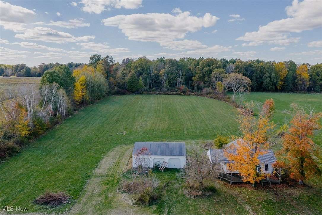 5 Acres of Residential Land with Home for Auction in North Benton, Ohio