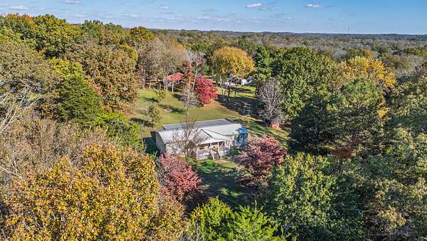 23.7 Acres of Agricultural Land with Home for Sale in Columbia, Tennessee