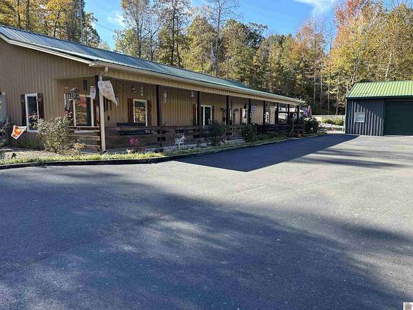 7.39 Acres of Residential Land with Home for Sale in Gilbertsville, Kentucky