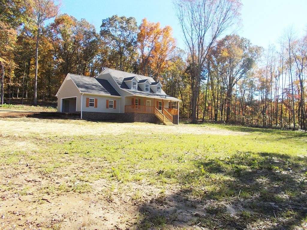 2 Acres of Land with Home for Sale in Holladay, Tennessee