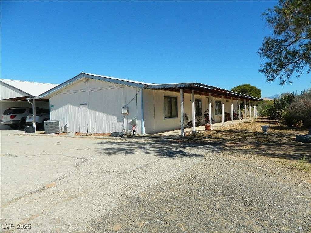 2.3 Acres of Residential Land with Home for Sale in Logandale, Nevada