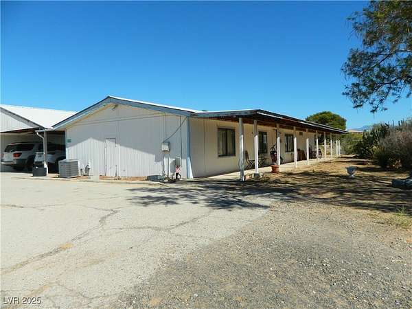 2.3 Acres of Residential Land with Home for Sale in Logandale, Nevada
