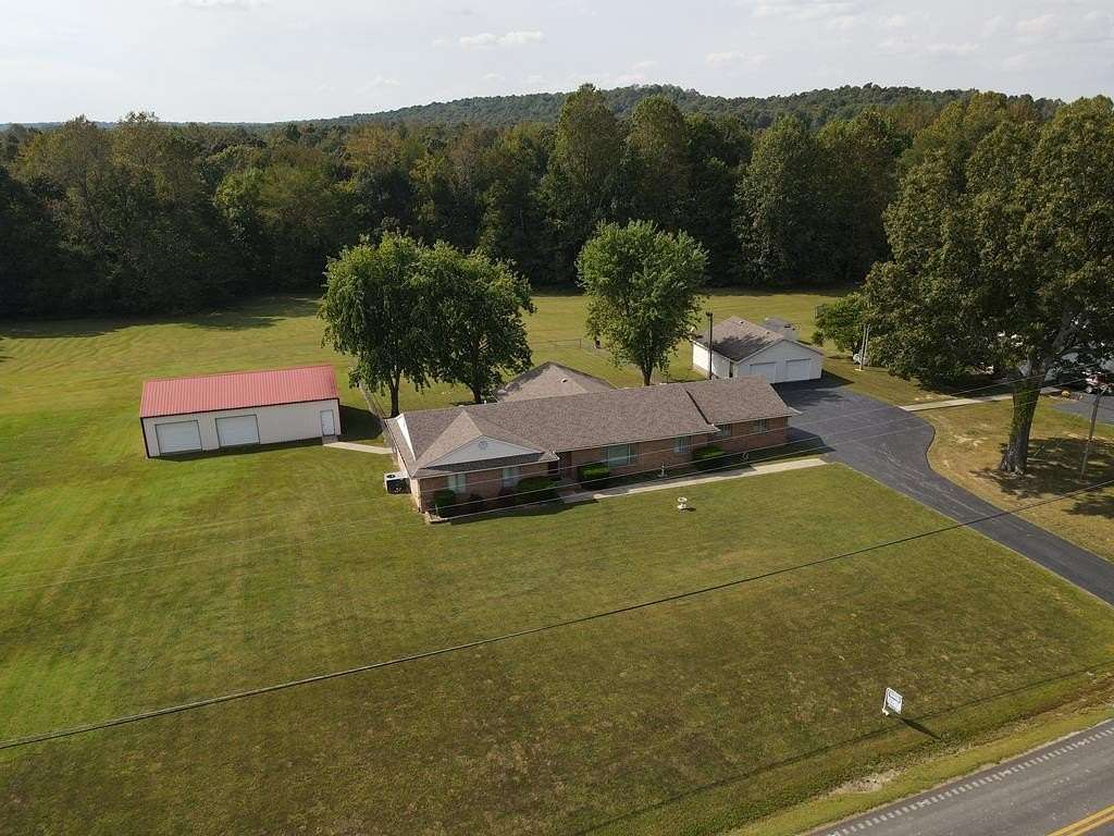 5.3 Acres of Residential Land with Home for Sale in Nortonville, Kentucky