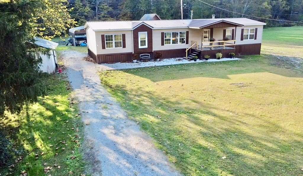 4.6 Acres of Residential Land with Home for Sale in Salyersville, Kentucky