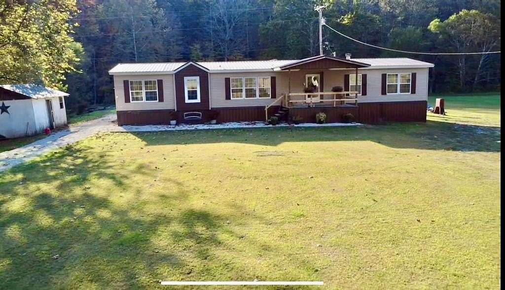 4.6 Acres of Residential Land with Home for Sale in Salyersville, Kentucky