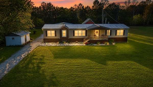4.6 Acres of Land with Home for Sale in Salyersville, Kentucky