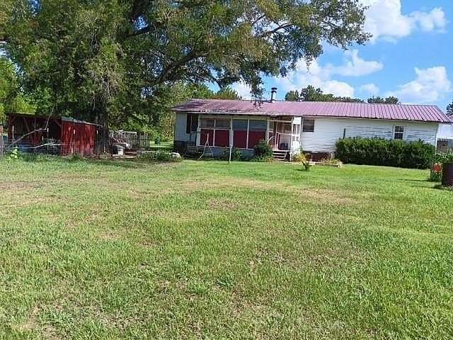 1.81 Acres of Residential Land with Home for Sale in Clarksville, Texas