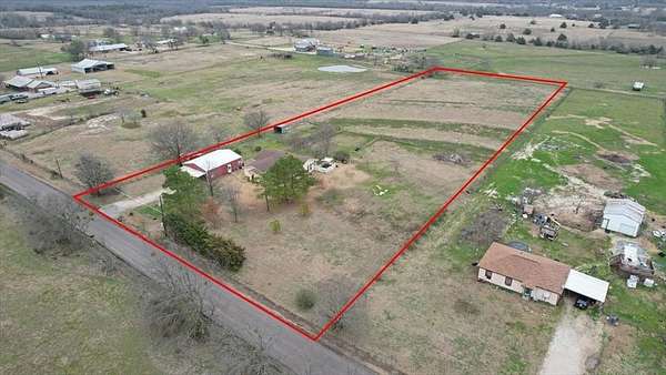 4 Acres of Residential Land with Home for Sale in Commerce, Texas