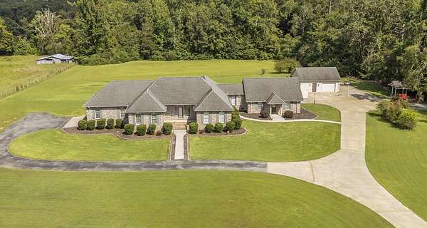 10.2 Acres of Land with Home for Sale in Savannah, Tennessee